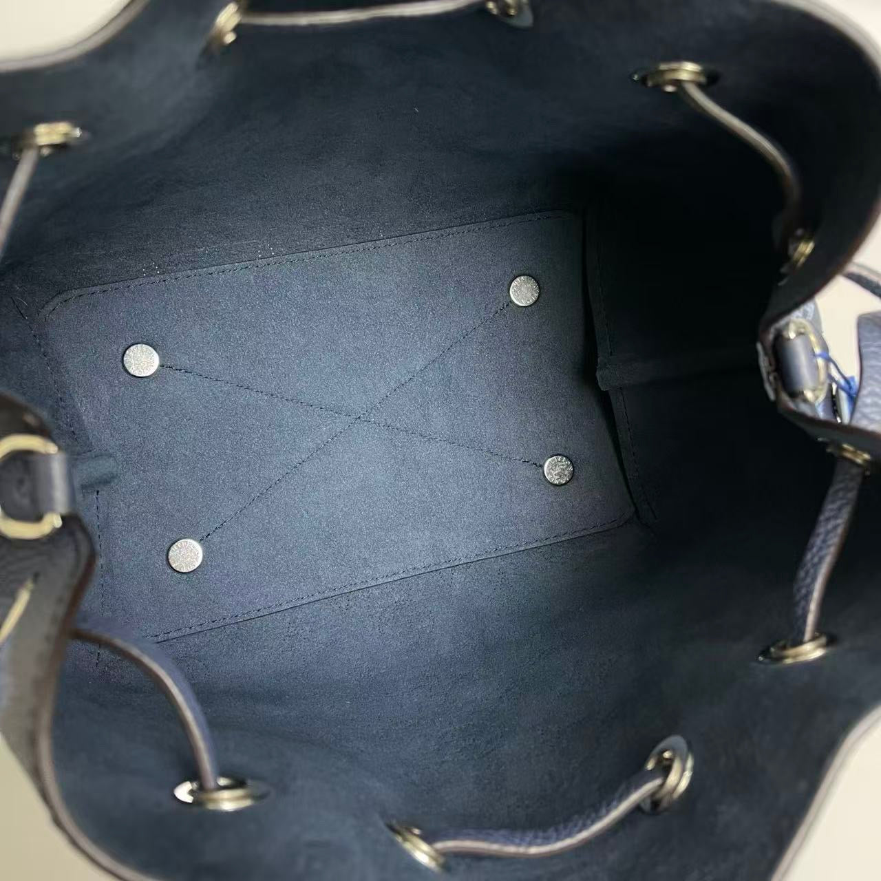 Louis Vuitton Bella Mahina Leather Bag