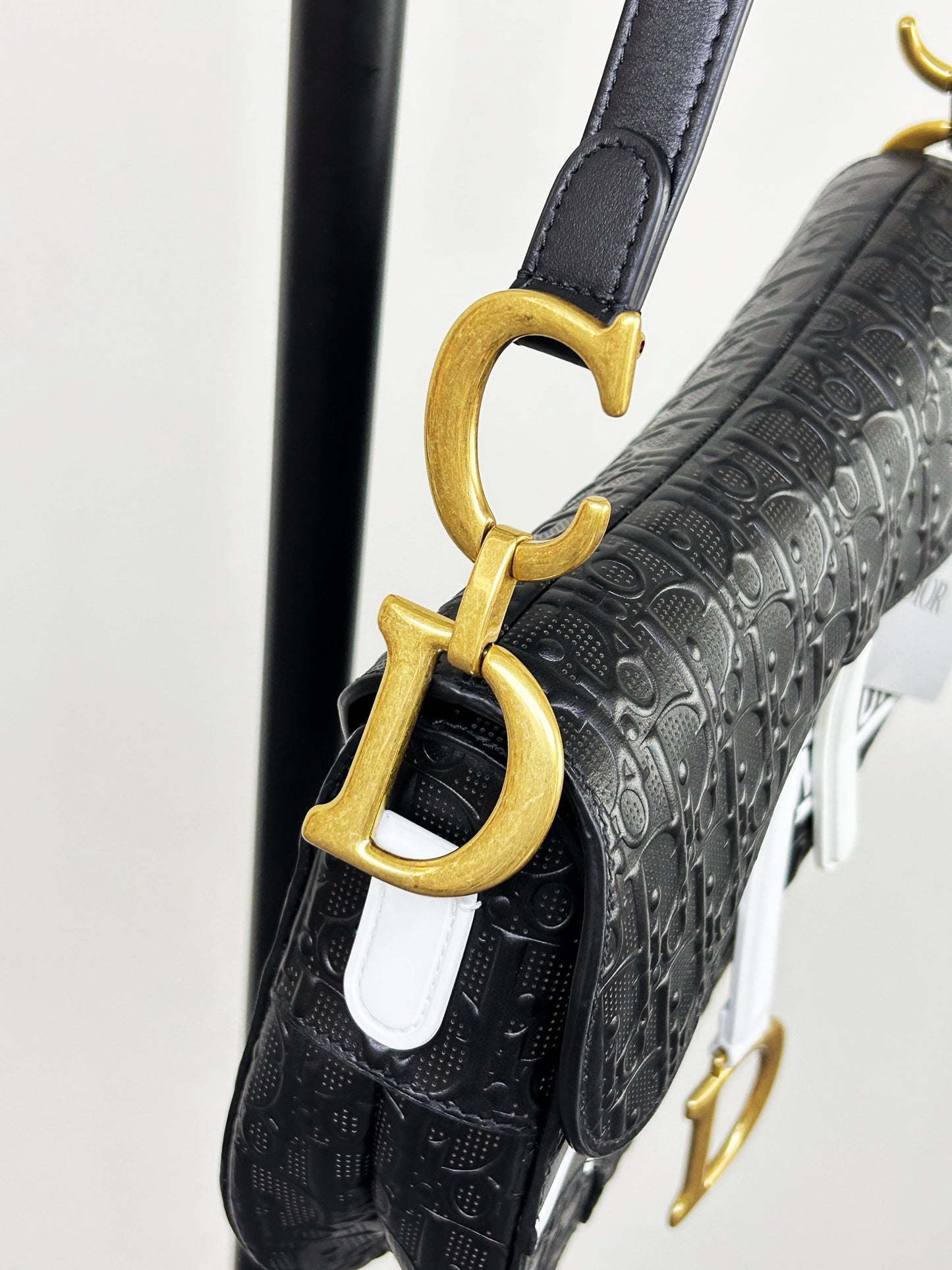 Dior Saddle Bag — Black & White Embossed Leather