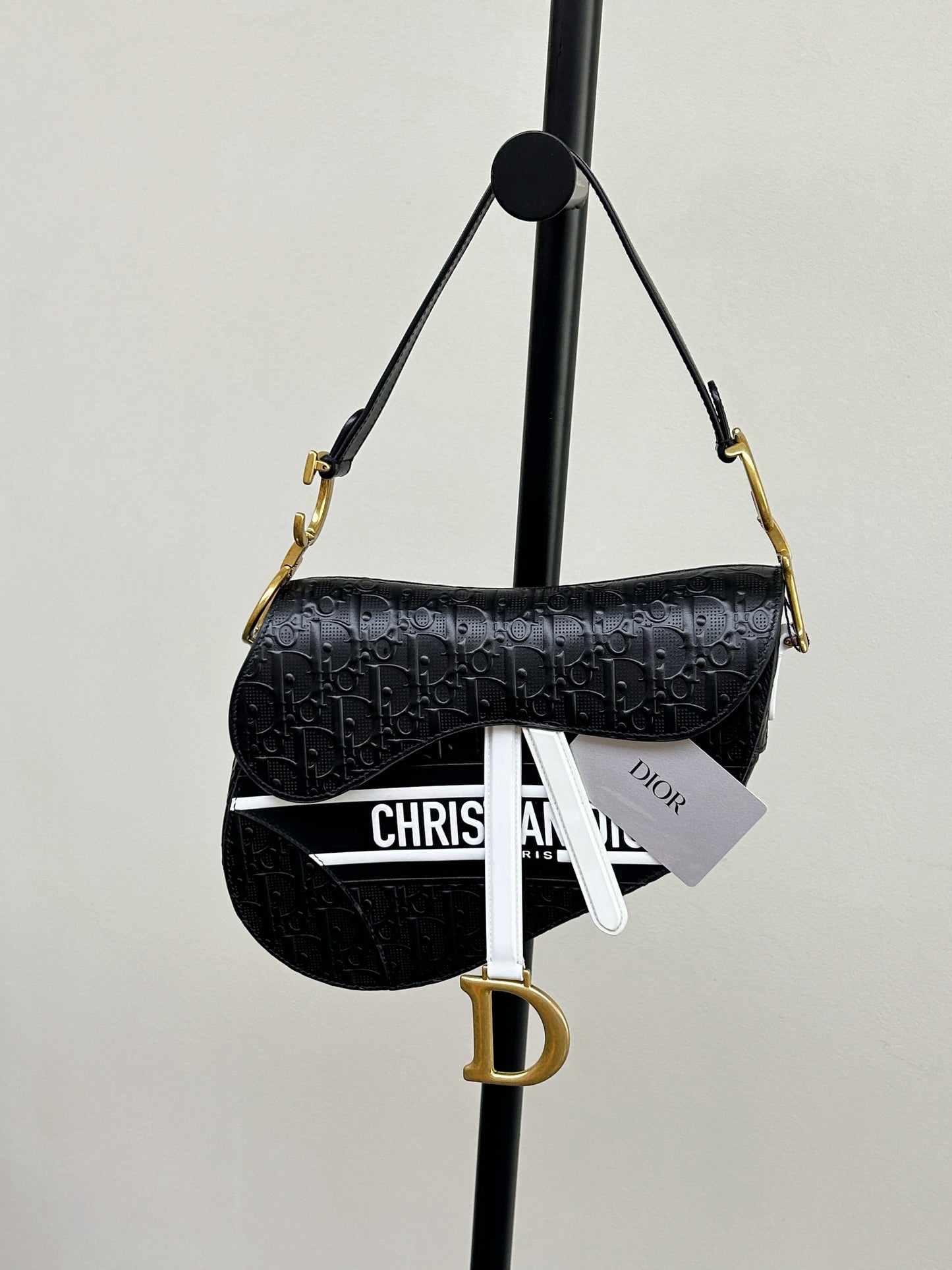Dior Saddle Bag — Black & White Embossed Leather