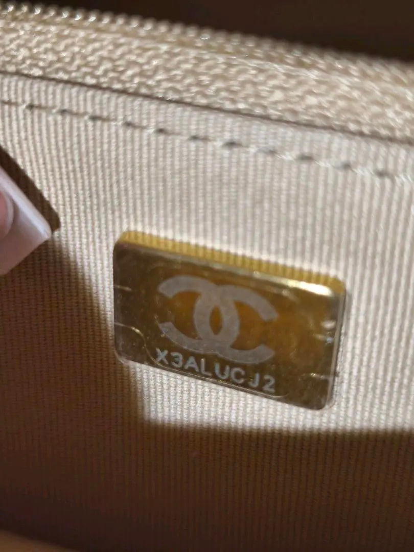 Chanel Boy WOC — V-Quilted Beige Caviar