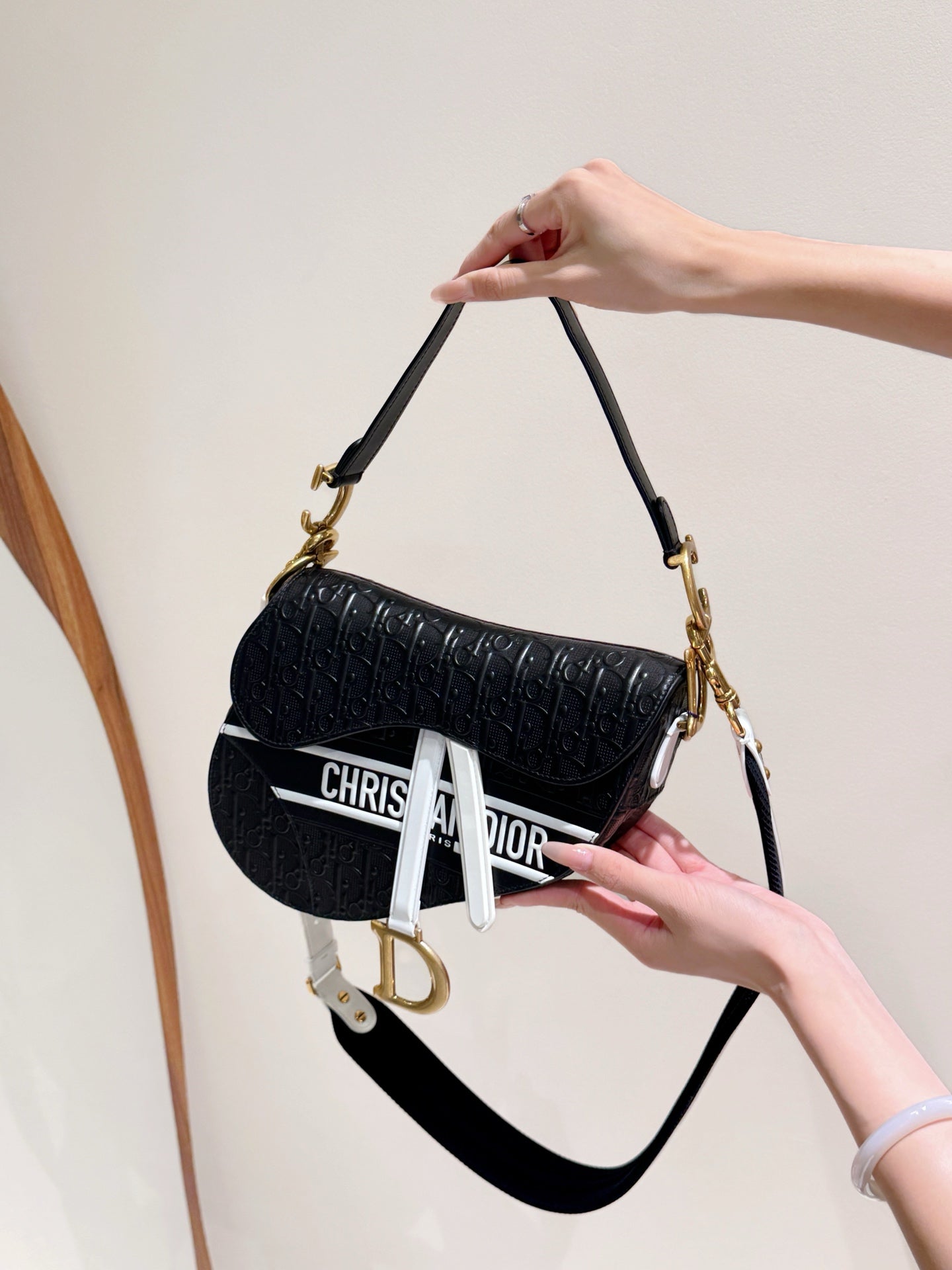 Dior Saddle Bag — Black & White Embossed Leather