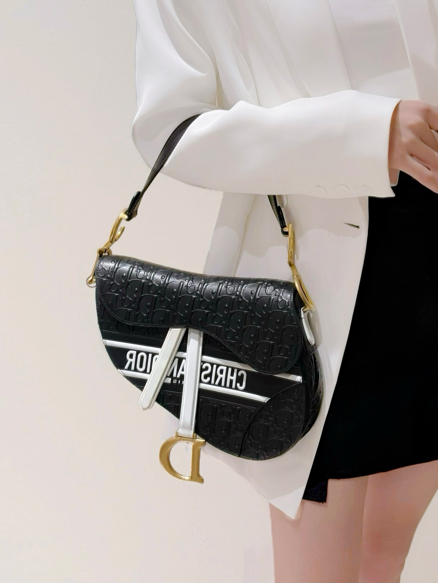 Dior Saddle Bag — Black & White Embossed Leather